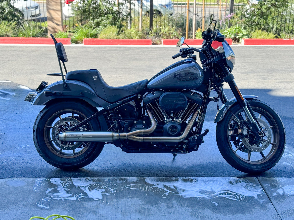 Stealth Pipes exhaust system installed on Harley M8 Softail – rear-side view of muffler and headers (2017–2025), photo 32 of 36