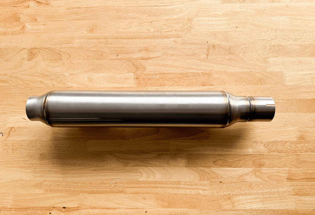 Close-up of Stealth Pipes Mid-Length Pipe Bomb Muffler – cone tip with Stealth logo engraving, photo 3 of 10