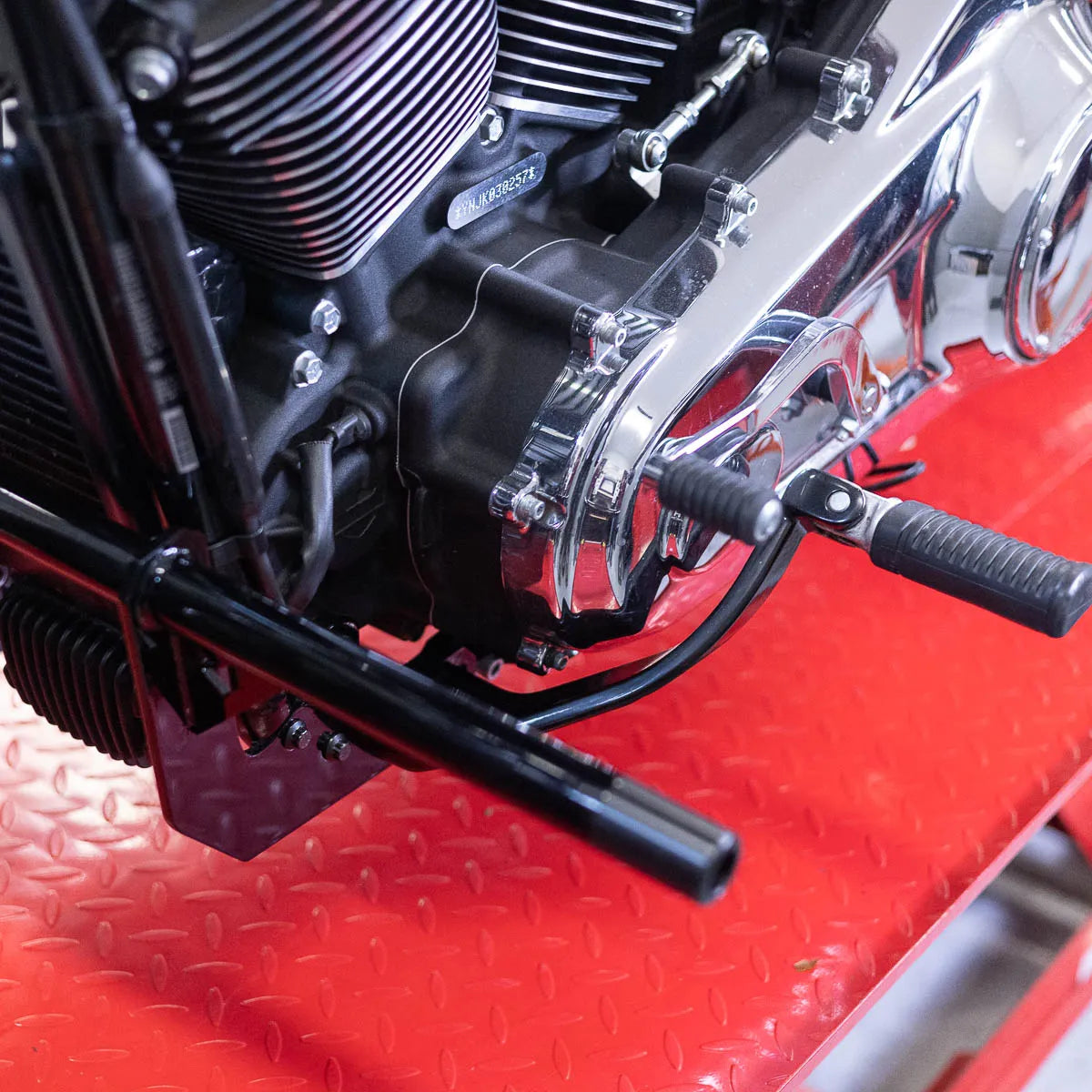 A black Softail Front Crash Bar designed for motorcycles, displayed installed on motorcycle., photo 6 of 10