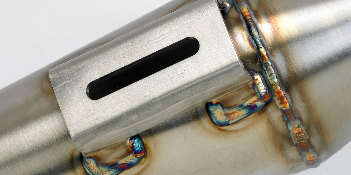 Close-up of Stealth Pipes Reverse Cone Muffler – TIG weld detail and engraved logo, photo 5 of 14